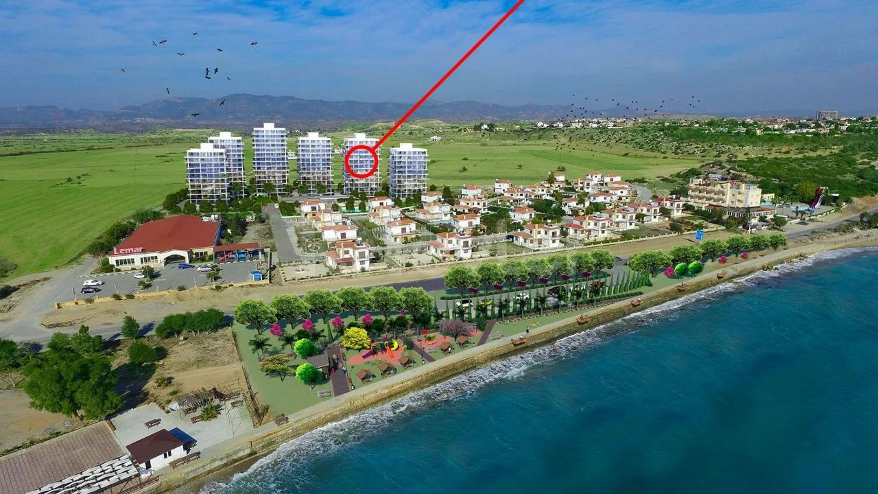 Aerial view locating Abelia Residence beside the coast